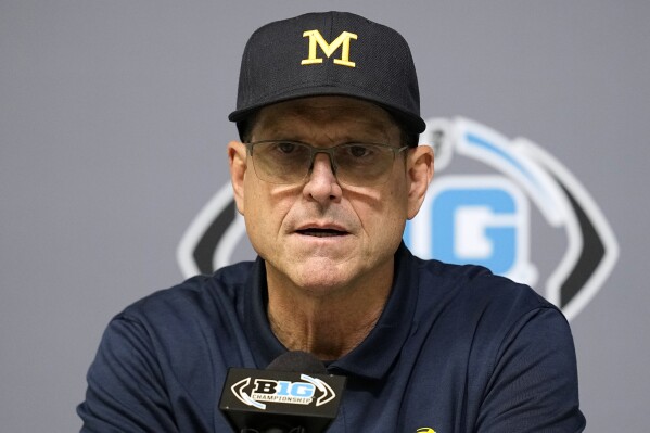 Michigan head coach Jim Harbaugh speaks during a news conference after the Big Ten championship NCAA college football game against Iowa, Sunday, Dec. 3, 2023, in Indianapolis. Michigan won 26-0. (AP Photo/Darron Cummings)