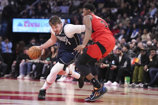 Doncic gets 11th triple-double of season on 25th birthday as Mavericks beat  Raptors 136-125 | AP News