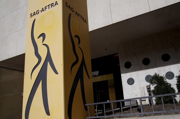 The entrance of SAG-AFTRA offices are see in Los Angeles on Friday, Nov. 10, 2023. Hollywood's months of labor unrest are coming to an end, but the post-strike landscape that awaits actors and writers may be far from happy-ever-after. (AP Photo/Richard Vogel)