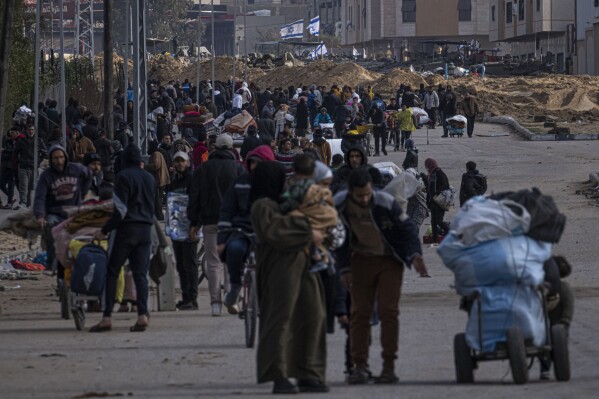 Palestinians flee Israeli ground offensive in Kahn Younis, Gaza Strip, Saturday, Jan. 27, 2024. (AP Photo/Fatima Shbair)