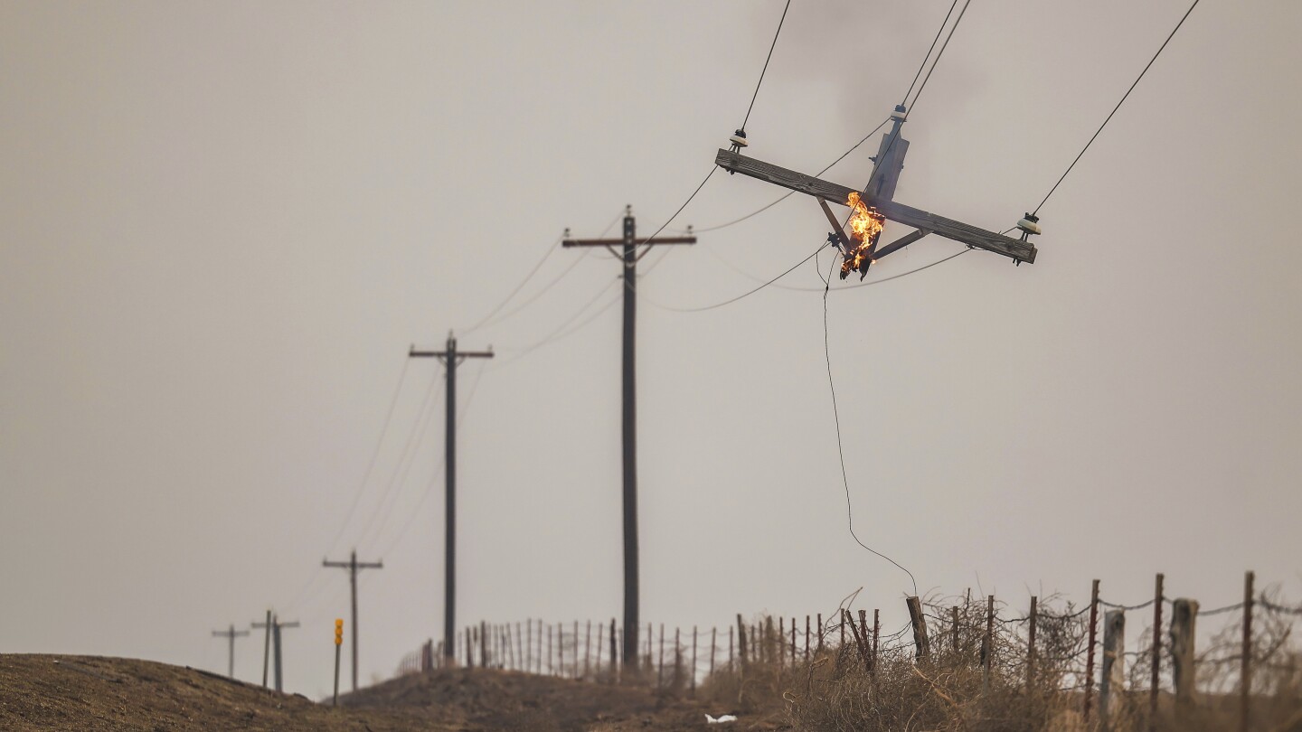 Wildfire grows into one of largest in Texas history as flames menace multiple small towns