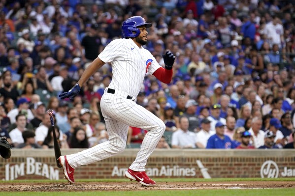 Candelario makes successful return to Chicago Cubs as Mancini is cut to  make room on roster