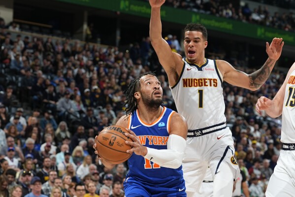Porter and Jokic turn in big nights, lead Nuggets to 113-100 win over Knicks