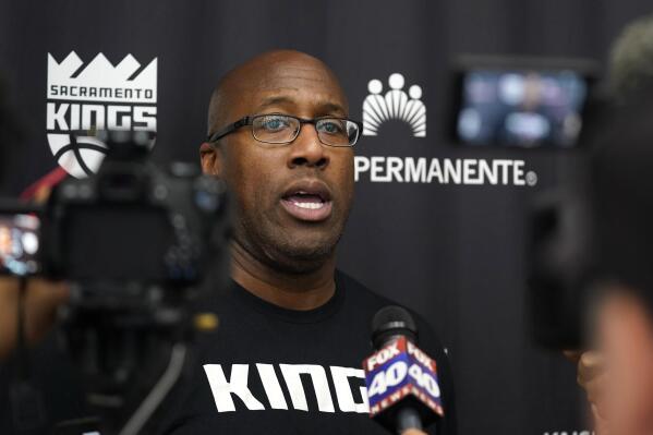 Sacramento Kings head coach Mike Brown talks with reporters at the NBA basketball team's training camp in Sacramento, Calif., Thursday, Oct. 6, 2022. (AP Photo/Rich Pedroncelli)
