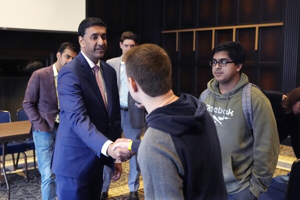 U.S. Rep. Ro Khanna, D-Ca., greets attendees after speaking to a group of college Democrats, Thursday, Feb. 22, 2024, in Ann Arbor, Mich. Khanna's visit to Michigan includes meetings with Arab American leaders in metro Detroit. The visit comes ahead of the state's Feb. 27 presidential primary. (AP Photo/Carlos Osorio)