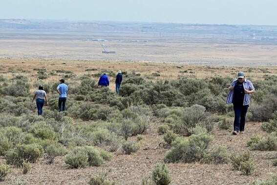 Experts from the Yakama Nation visit a Nike Missile site, which had been used to protect Hanford nuclear site from enemy aircraft, to examine the completed cleanup work and determine future restoration options near Richland, Wash., on June 15, 2023. The site in southeastern Washington state is located on Rattlesnake Mountain, which is considered sacred for Yakama Nation and other tribes. (Rose Ferri via AP)