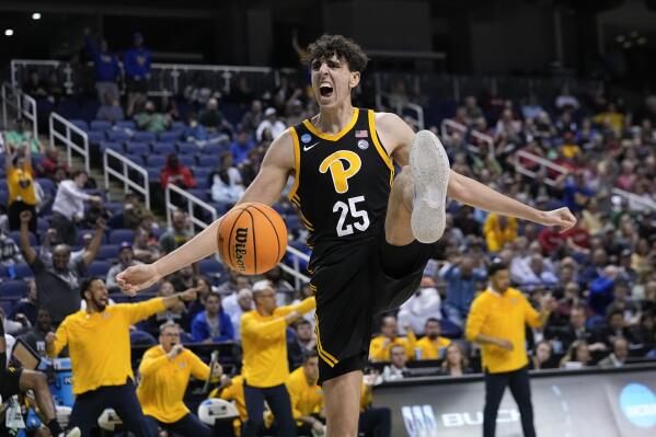 Pittsburgh forward Guillermo Diaz Graham (25) reacts after scoring during the second half of a first-round college basketball game against Iowa State in the NCAA Tournament on Friday, March 17, 2023, in Greensboro, N.C. (AP Photo/John Bazemore)