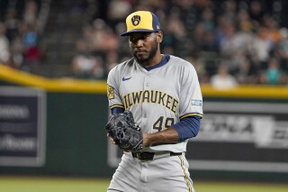 Cubs claim reliever Enoli Paredes off waivers from the Brewers | AP News
