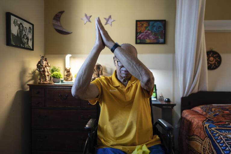 Alex Morisey does his afternoon exercises in his room at a nursing home in Philadelphia, on Wednesday, Feb. 15, 2023. For U.S. nursing home residents receiving Medicaid, all income is garnished and the person is left to rely on a small subsidy known as a personal needs allowance. The federal government hasn't changed the minimum rate, $30 monthly, since 1987. Pennsylvania’s allowance is $45. (AP Photo/Wong Maye-E)