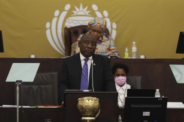 FILE - South African President Cyril Ramaphosa addresses parliament in Cape Town, South Africa, Thursday, June 9, 2022. Ramaphosa could face criminal charges and is already facing calls to step down over claims that he tried to cover up the theft of millions of dollars in U.S. currency that was hidden inside furniture at his game farm. (AP Photo/Nardus Engelbrecht, File)