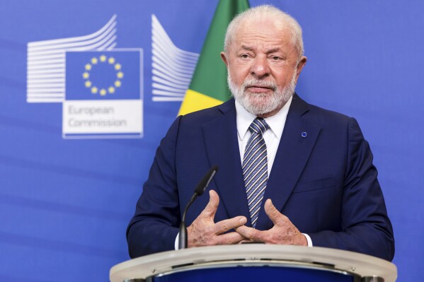 FILE - Brazil's President Lula da Silva addresses the media prior to a meeting with European Commission President Ursula von der Leyen at EU headquarters in Brussels, July 17, 2023. Lula da Silva said Wednesday Aug. 2, 2023, that he supports more countries joining the BRICS group of large developing nations, which currently includes Brazil, Russia, India, China and South Africa. (AP Photo/Geert Vanden Wijngaert, File)