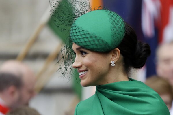 FILE - In this Monday, March 9, 2020 file photo, Britain's Meghan, the Duchess of Sussex leaves after attending the annual Commonwealth Day service at Westminster Abbey in London. A British judge on Wednesday Aug. 5, 2020, has ruled that the Duchess of Sussex can keep her friends’ names secret while she brings a privacy-invasion lawsuit against a British newspaper. (AP Photo/Kirsty Wigglesworth, File)