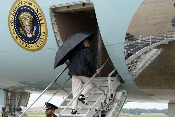 President Donald Trump boards Air Force One as he departs Saturday, Aug. 29, 2020, at Andrews Air Force Base, Md. Trump is en route to tour damage from Hurricane Laura in Texas and Louisiana. (AP Photo/Alex Brandon)