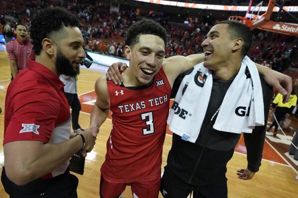 Texas Tech guard Clarence Nadolny (3) celebrates the team's win over Texas in an NCAA college basketball game, Saturday, Feb. 19, 2022, in Austin, Texas. (AP Photo/Eric Gay)