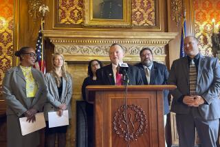 Wisconsin Rep. Scott Krug, the Republican chair of the Assembly elections committee, presents a package of election bills alongside a bipartisan group of state lawmakers on Thursday, May 4, 2023, in Madison, Wis. (AP Photo/Harm Venhuizen)