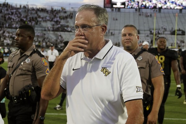 Central Florida head coach Gus Malzahn walks off the filed after losing to Baylor in an NCAA college football game, Saturday, Sept. 30, 2023, in Orlando, Fla. (AP Photo/John Raoux)