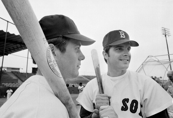 FILE - In this March 17, 1969 file photo, Brothers Billy Conigliaro, left, and Tony Conigliaro, of the Boston Red Sox appear together at an exhibition game in Winter Haven, Fla., March 17, 1969.  Billy Conigliaro, the first-ever Red Sox draft pick who started out in the Boston outfield with star-crossed brother Tony and later spent years taking care of him after a heart attack, died Wednesday, Feb. 10, 2021. He was 73.. (AP Photo/Harry Harris, File)