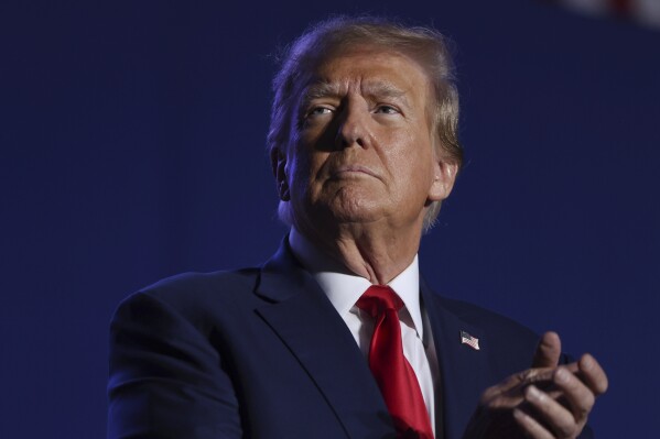 FILE - Former President Donald Trump speaks at a campaign rally, Saturday, Dec. 16, 2023, in Durham, N.H. The Colorado Supreme Court on Tuesday, Dec. 19, declared Trump ineligible for the White House under the U.S. Constitution’s insurrection clause and removed him from the state’s presidential primary ballot, setting up a likely showdown in the nation’s highest court to decide whether the front-runner for the GOP nomination can remain in the race. (AP Photo/Reba Saldanha, File)