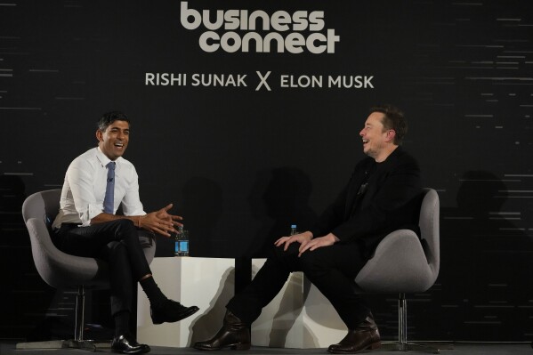 Britain's Prime Minister Rishi Sunak, left, attends an in-conversation event with Tesla and SpaceX's CEO Elon Musk in London, Thursday, Nov. 2, 2023. Sunak discussed AI with Elon Musk in a conversation that is played on the social network X, which Musk owns.(APPhoto/Kirsty Wigglesworth, Pool)