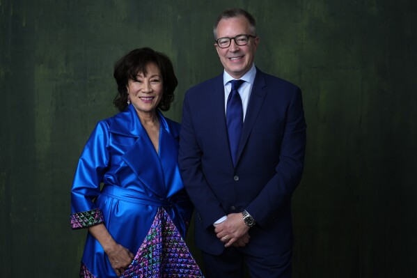 President of the Academy of Motion Picture Arts and Sciences Janet Yang, left, and CEO of the Academy of Motion Picture Arts and Sciences Bill Kramer poses for a portrait during the 96th Academy Awards Oscar nominees luncheon on Monday, Feb. 12, 2024, at the Beverly Hilton Hotel in Beverly Hills, Calif. (APPhoto/Chris Pizzello)