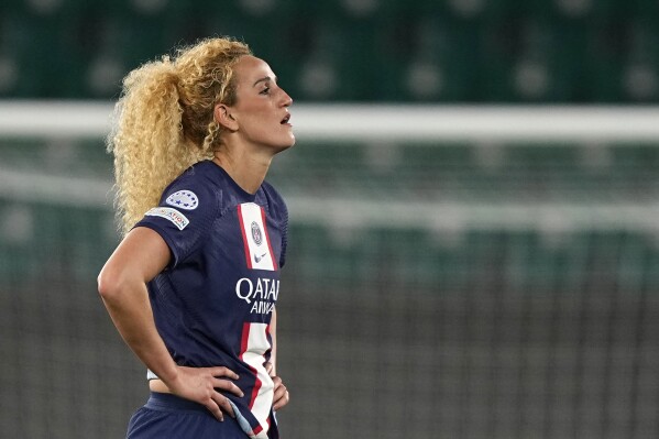 Then-PSG's Kheira Hamraoui stands on the field after the women's Champions League soccer quarterfinal second leg soccer match between VfL Wolfsburg and Paris Saint-Germain in Wolfsburg, Germany, March 30, 2023. (AP Photo/Martin Meissner, file)