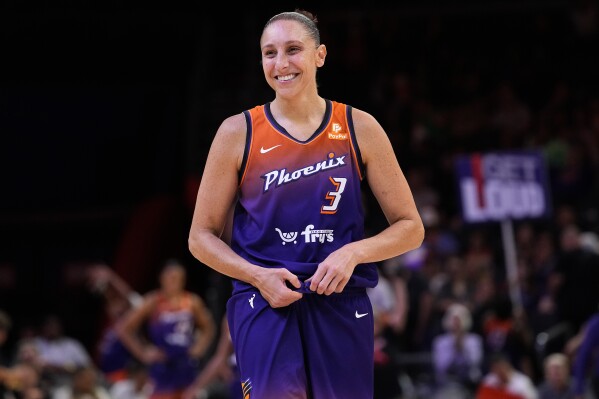 Phoenix Mercury's Diana Taurasi smiles during the second half of a WNBA basketball game against the Atlanta Dream, Thursday, Aug. 3, 2023, in Phoenix. (AP Photo/Matt York)