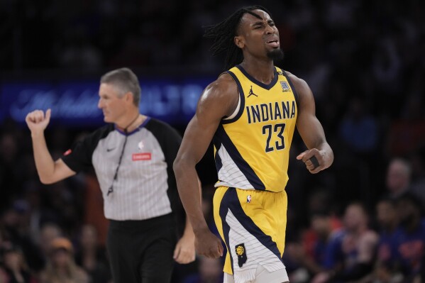Indiana Pacers' Aaron Nesmith (23) reacts to a foul called against him during the first half of Game 5 in an NBA basketball second-round playoff series against the New York Knicks, Tuesday, May 14, 2024, in New York. (AP Photo/Frank Franklin II)