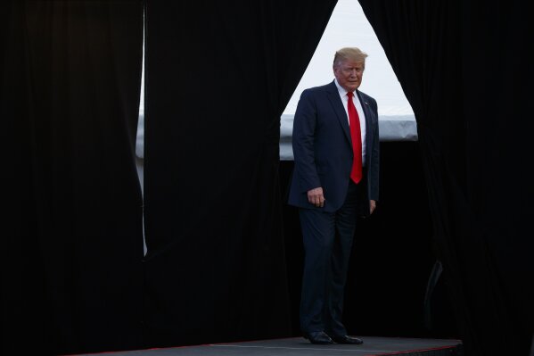 
              President Donald Trump arrives to speak at a rally at Aaron Bessant Amphitheater, Wednesday, May 8, 2019, in Panama City Beach, Fla. (AP Photo/Evan Vucci)
            