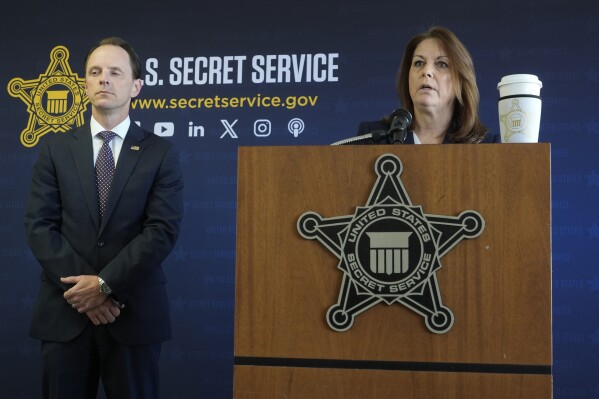 U.S. Secret Service Director Kimberly Cheatle speaks during a Republican National Convention security news conference Thursday, June 6, 2024, in Milwaukee. At left is FBI special agent Michael Hensle. (AP Photo/Morry Gash)