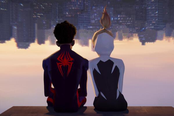 This image released by Sony Pictures Animation shows Miles Morales as Spider-Man, voiced by Shameik Moore, left, and and Spider-Gwen, voiced by Hailee Steinfeld, in a scene from Columbia Pictures and Sony Pictures Animation's "Spider-Man: Across the Spider-Verse." (Sony Pictures Animation via AP)