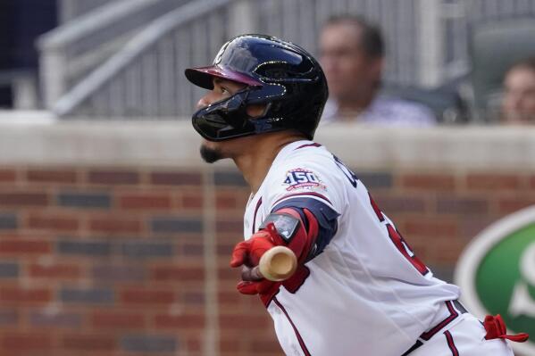 Atlanta Braves' William Contreras follows through on a two-run single in the first inning of a baseball against the Washington Nationals, Monday, May 31, 2021, in Atlanta. (AP Photo/John Bazemore)