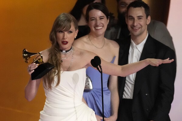 Taylor Swift accepts the award for album of the year for "MIdnights" during the 66th annual Grammy Awards on Sunday, Feb. 4, 2024, in Los Angeles. (APPhoto/Chris Pizzello)