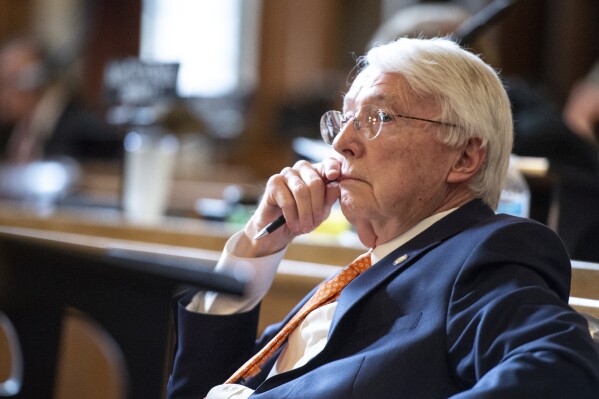 FILE - Nebraska Sen. Merv Riepe ponders before voting on a bill to ban abortions in Nebraska after about six weeks, April 27, 2023, at the state Capital in Lincoln, Neb. Riepe, the Nebraska lawmaker who tanked an effort in 2023 by his fellow Republicans to pass a near-total abortion ban, has given top priority this year to a bill that would allow abortions beyond the state's 12-week ban in cases of fatal fetal anomalies. (Larry Robinson/Lincoln Journal Star via AP, File)