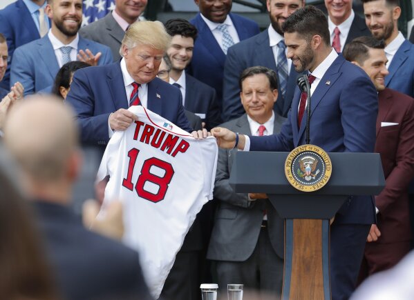 Against backdrop of controversy, Red Sox honored by Trump