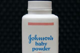 FILE - In this April 15, 2011, file photo, a bottle of Johnson's baby powder is displayed. Johnson & Johnson is asking for Supreme Court review of a $2 billion verdict in favor of women who claim they developed ovarian cancer from using the company's talc products. (AP Photo/Jeff Chiu, File)