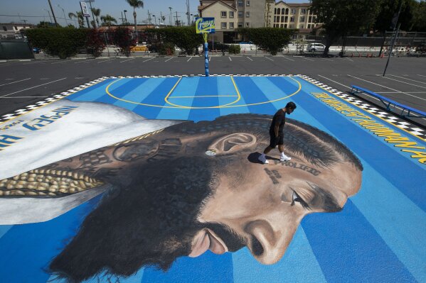 Street art of Nipsey Hussle in LA breathes life into legacy