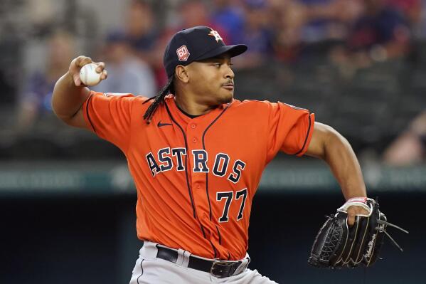 Houston Astros starting pitcher Luis Garcia throws during the first inning of a baseball game against the Texas Rangers in Arlington, Texas, Wednesday, June 15, 2022. (AP Photo/LM Otero)