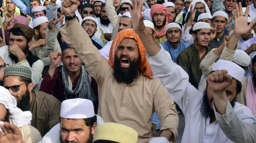 Supporters of a religious group 'Jamiat Ulema-e-Islam-F' party chant slogans during a rally to denounce the burning of Islam's holy book 'Quran,' in Sweden in Quetta, Pakistan, Sunday, July 23, 2023. (AP Photo/Arshad Butt)