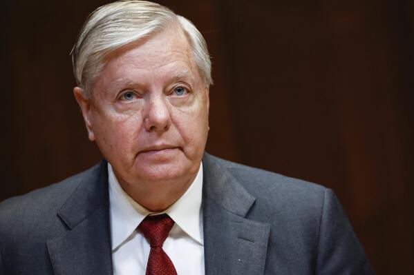 FILE - Sen. Lindsey Graham, R-S.C., listens during a hearing on the fiscal year 2023 budget for the FBI in Washington, on May 25, 2022. Attorneys for Graham said in a court filing on July 13, he wasn't trying to interfere in Georgia's 2020 election when he called state officials to ask them to reexamine certain absentee ballots after President Donald Trump's narrow loss to Democrat Joe Biden. (Ting Shen/Pool Photo via AP, File)
