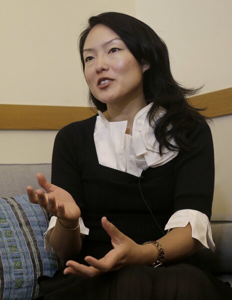
              In this June 26, 2017, photo, city supervisor Jane Kim is interviewed at City Hall in San Francisco. Kim is calling for a tax on companies that automate jobs once held by people. (AP Photo/Jeff Chiu)
            