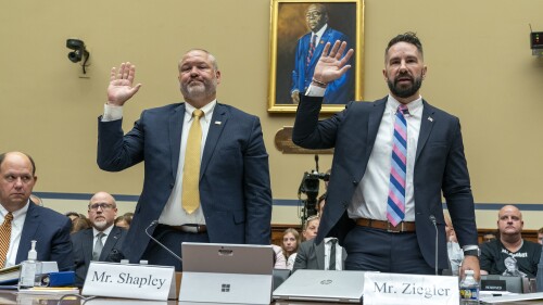 IRS Supervisory Special Agent Gary Shapley, left, and IRS Criminal Investigator Joseph Ziegler, are sworn in at a House Oversight and Accountability Committee hearing with IRS whistleblowers, Wednesday, July 19, 2023, in Washington. (AP Photo/Jacquelyn Martin)