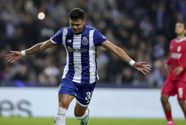 Porto's Evanilson celebrates scoring his side's first goal during a Champions League group H soccer match between Porto and Antwerp at Estadio do Dragao in Porto, Portugal, Tuesday, Nov. 7, 2023. (AP Photo/Miguel Pereira)