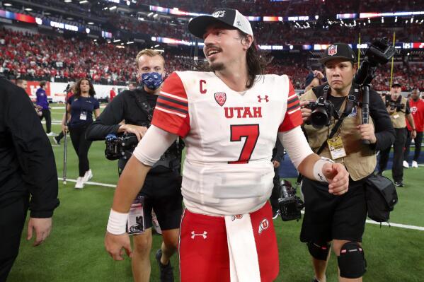 Utah quarterback Cameron Rising (7) walks across the field after Utah's 47-24 victory over Southern California in the Pac-12 Conference championship NCAA college football game Friday, Dec. 2, 2022, in Las Vegas. (AP Photo/Steve Marcus)