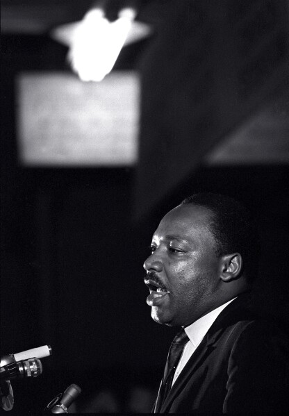 Dr. Martin Luther King Jr. makes his last public appearance at the Mason Temple in Memphis, Tenn., on April 3, 1968.  The following day King was assassinated on his motel balcony.  (AP Photo/Charles Kelly)