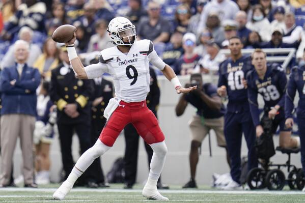 Quarterback Desmond Ridder of the Cincinnati Bearcats throws a pass