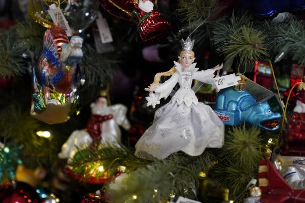 Christmas ornaments are seen at Blackhawk Hardware on Wednesday, Nov. 1, 2023, in Charlotte, N.C. All signs point to a relatively solid holiday season for America’s small businesses. Yet, owners of these businesses appear to have a collective anxiety about the months ahead. (AP Photo/Erik Verduzco)