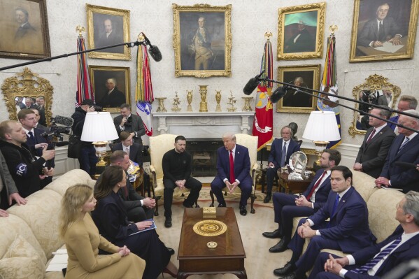 President Donald Trump, center right, meets with Ukrainian President Volodymyr Zelenskyy, center left, as Secretary of State Marco Rubio, seated from second right, and Vice President JD Vance listen at the Oval Office at the White House, Friday, Feb. 28, 2025, in Washington. (AP Photo/ Mystyslav Chernov, File)