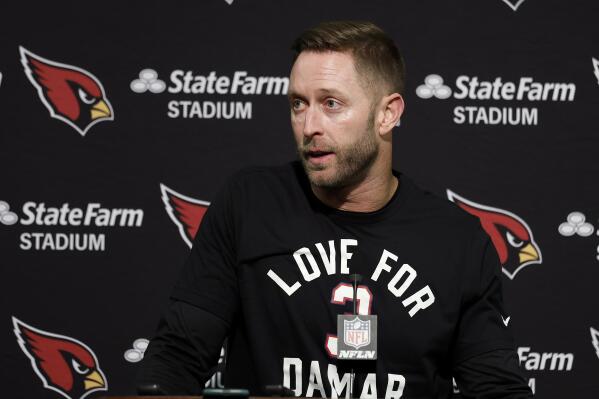 FILE - Arizona Cardinals head coach Kliff Kingsbury wears a shirt in support of Buffalo Bills' Damar Hamlin as he speaks at a news conference after the team's NFL football game against the San Francisco 49ers in Santa Clara, Calif., Sunday, Jan. 8, 2023. Kingsbury is joining Lincoln Riley's coaching staff at Southern California as a senior offensive analyst. USC announced the addition Tuesday, April 11, 2023. (AP Photo/Jed Jacobsohn, File)