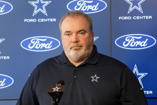 Dallas Cowboys head coach Mike McCarthy, takes questions during during a news conference at the team's NFL football headquarters in Frisco, Texas, Thursday, Jan. 18, 2024. (AP Photo/Tony Gutierrez)