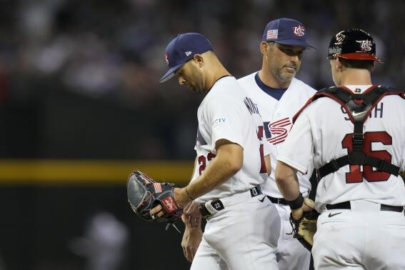 United States pitcher Nick Martinez, left, exits during the third inning of a World Baseball Classic game against Mexico in Phoenix, Sunday, March 12, 2023. (AP Photo/Godofredo A. Vásquez)